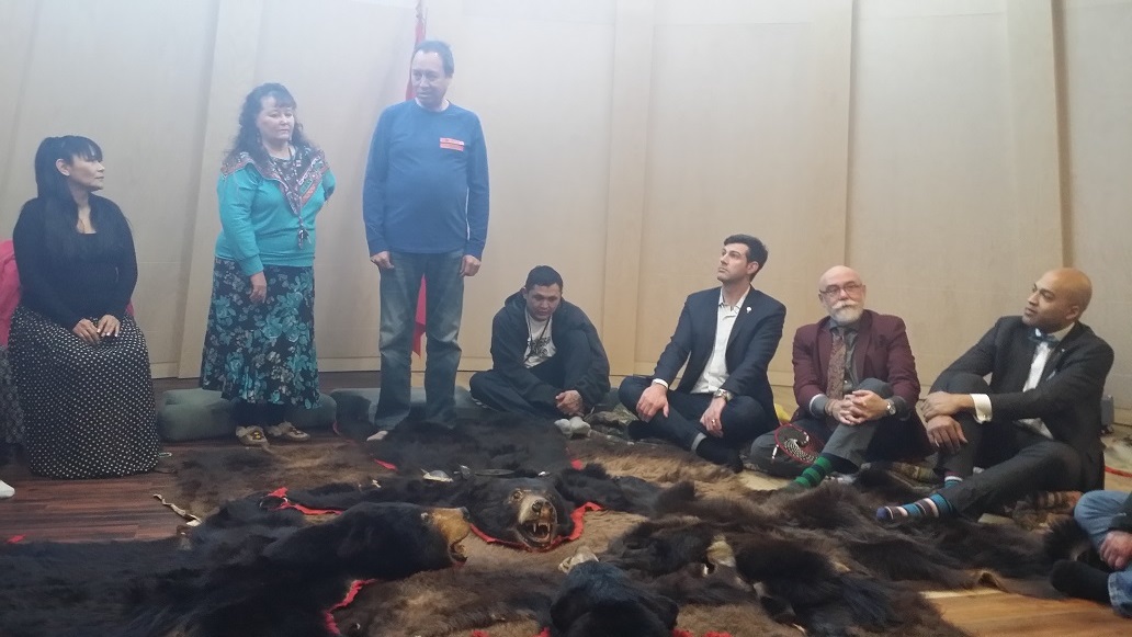 Mayor Don Iveson, Councillor Scott McKeen, and MLA David Shepherd join in a Indigenous ceremony at Ambrose Place